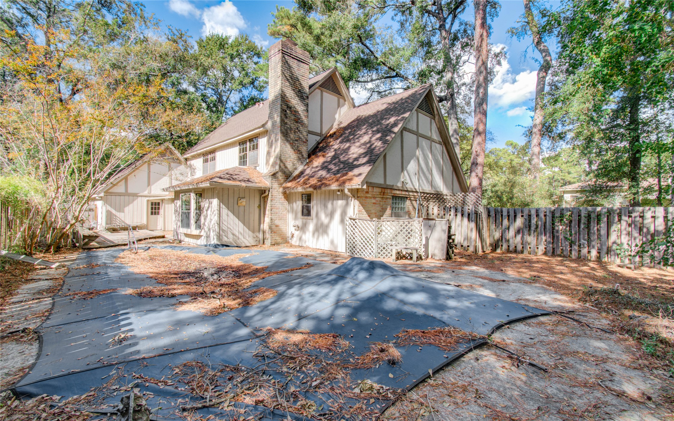 10715 East Timberwagon Circle Spring, TX 77380 - Photo 46 of 50 a view of a house with a yard