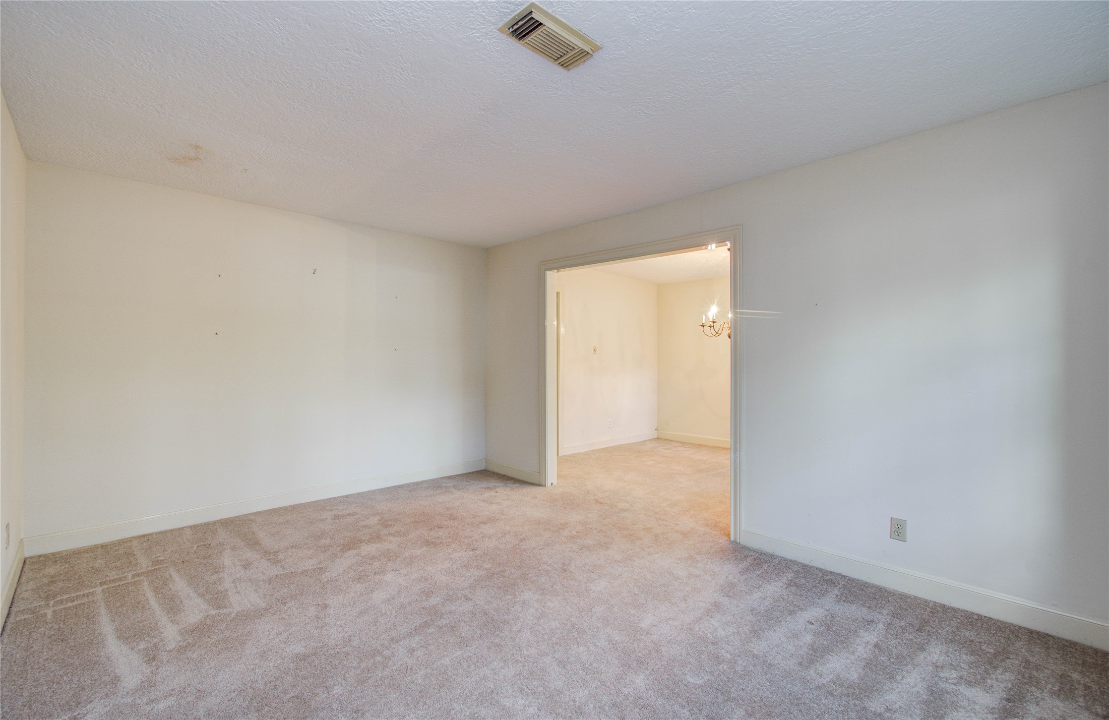 10715 East Timberwagon Circle Spring, TX 77380 - Photo 8 of 50 an empty room with an entryway