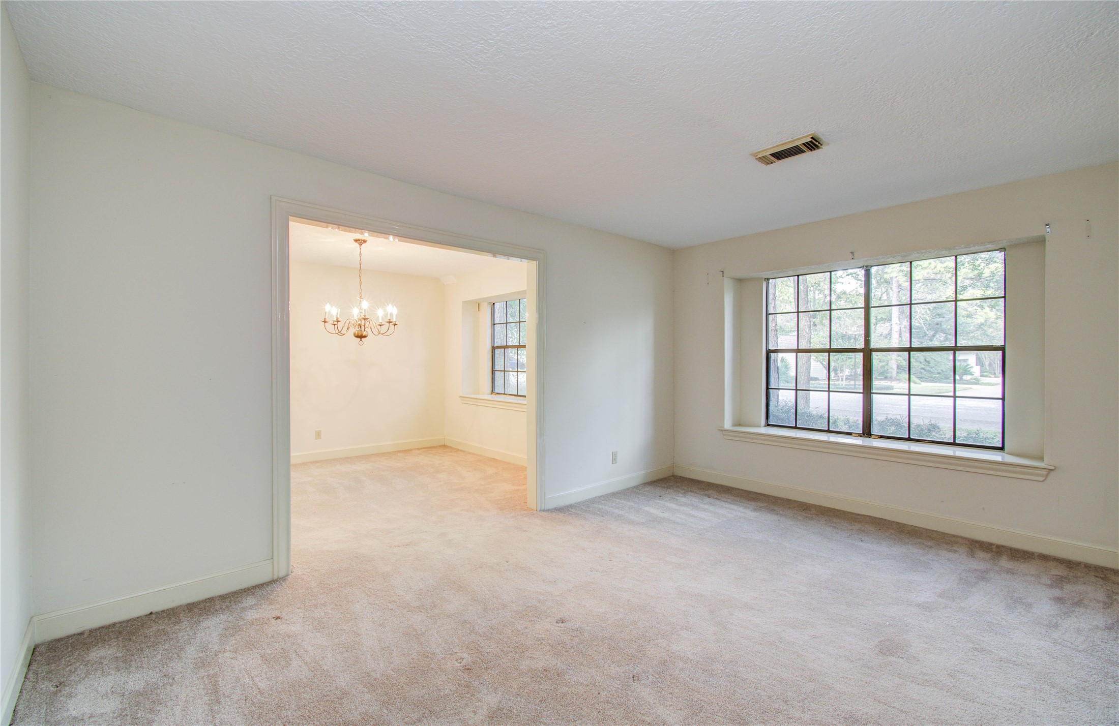 10715 East Timberwagon Circle Spring, TX 77380 - Photo 10 of 50 an empty room with windows