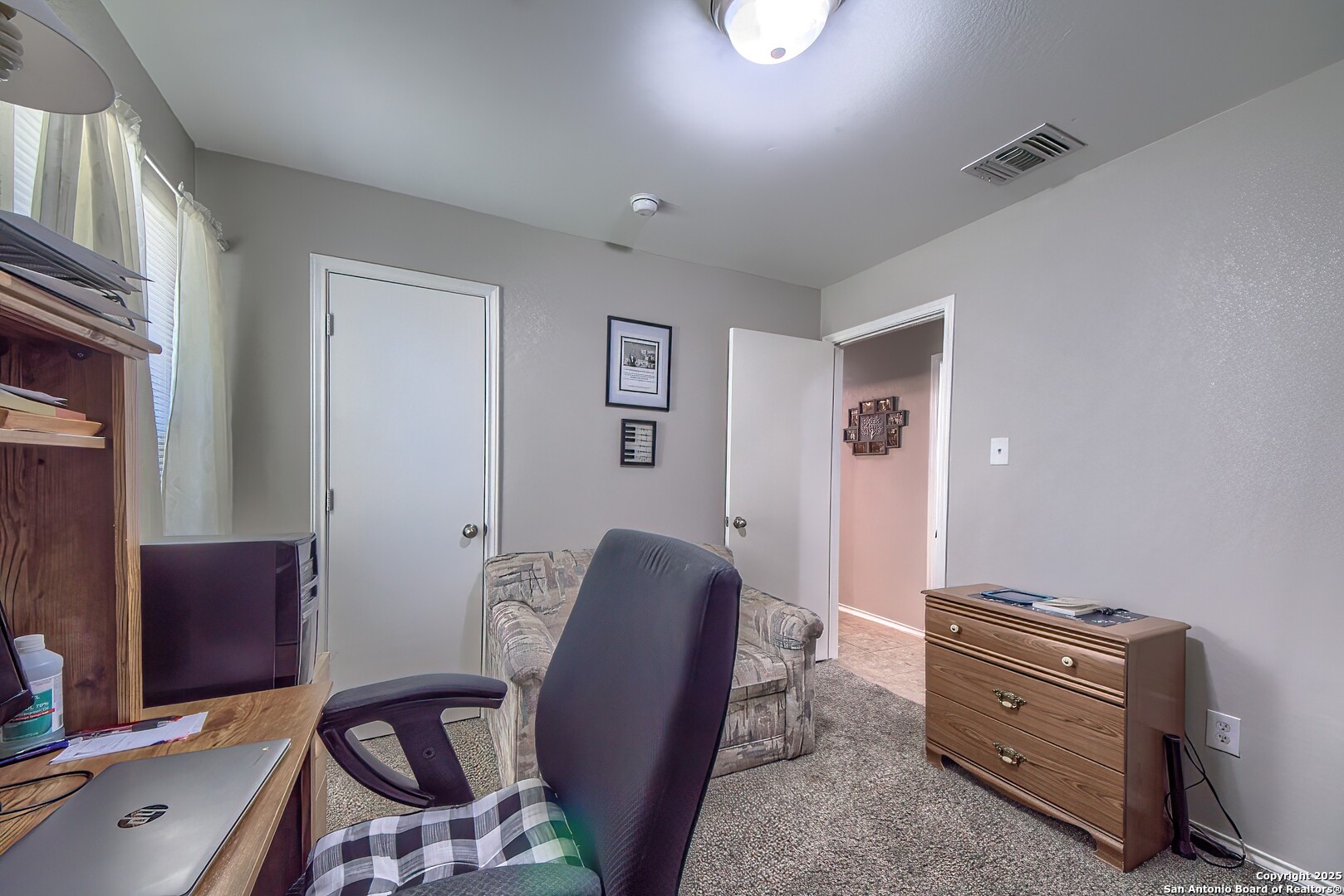 5709 Ping Way Cibolo, TX 78108 - Photo 21 of 28 a view of workspace with furniture and wooden floor