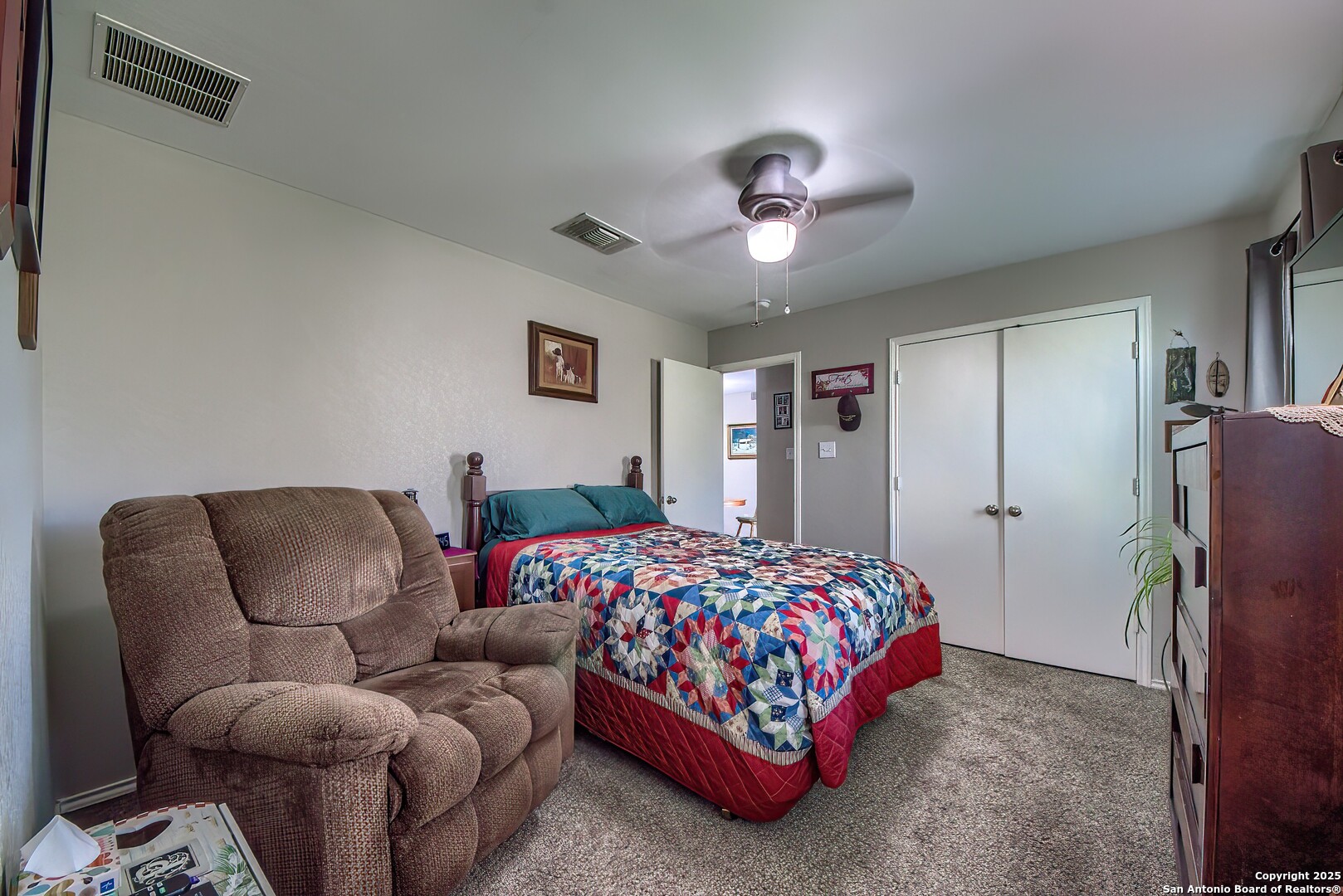 5709 Ping Way Cibolo, TX 78108 - Photo 24 of 28 a bedroom with a bed couch and window