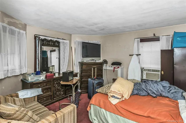 a living room with furniture fireplace and a flat screen tv
