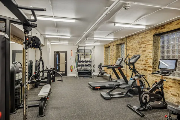 a view of a room with gym equipment