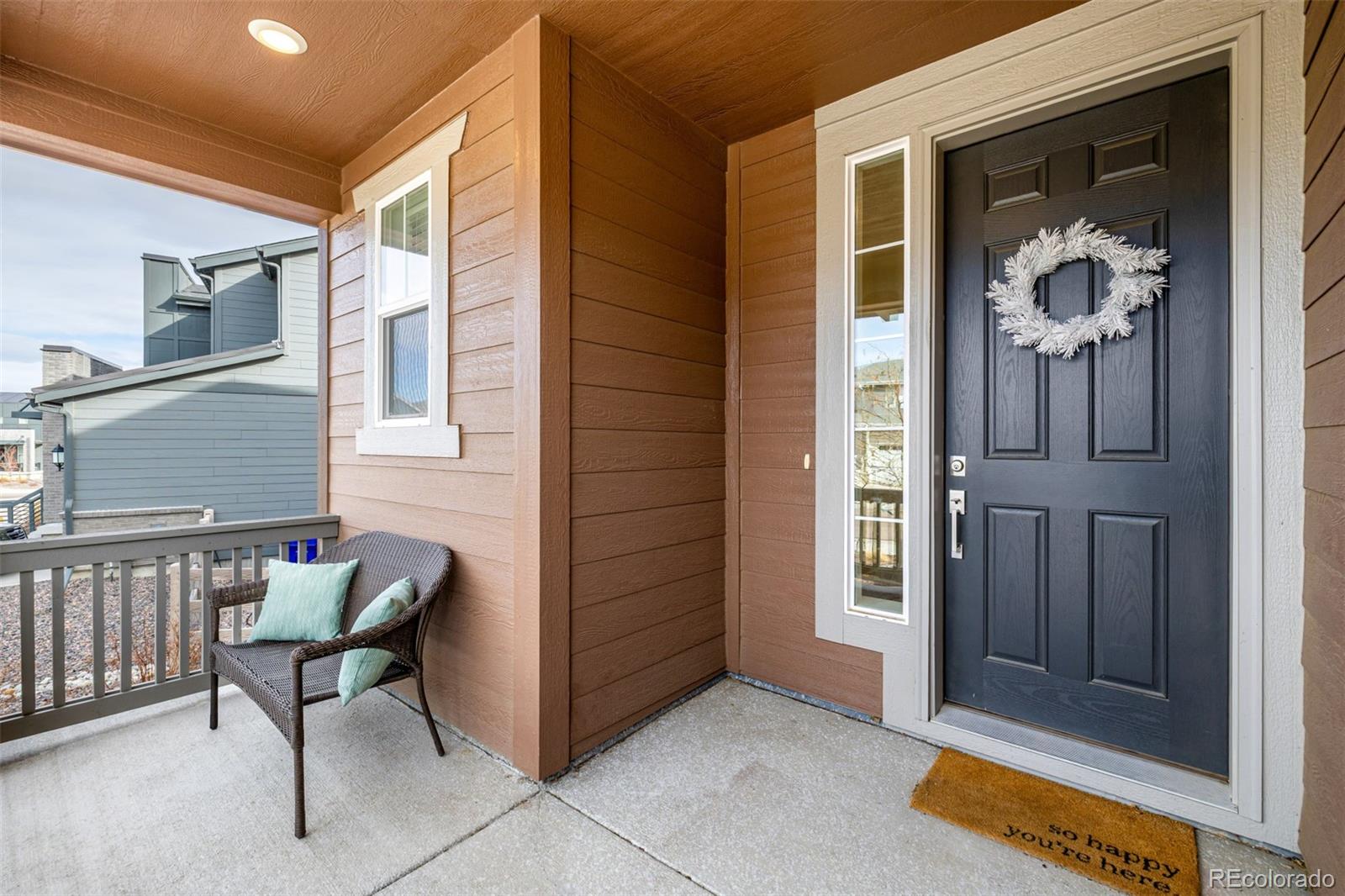 8184 Mt Lincoln Road Littleton, CO 80125 - Photo 2 of 46 a view of a porch with a table and chairs