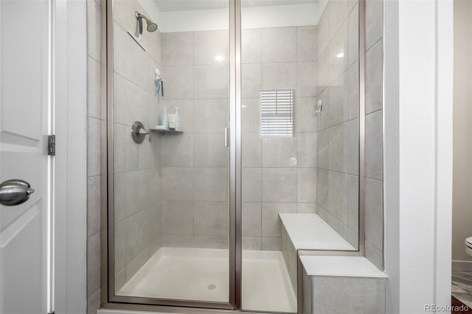 8184 Mt Lincoln Road Littleton, CO 80125 - Photo 24 of 46 a bathroom with a shower