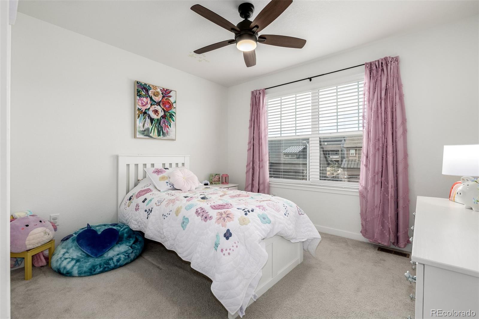 8184 Mt Lincoln Road Littleton, CO 80125 - Photo 28 of 46 a bedroom with a bed and a window