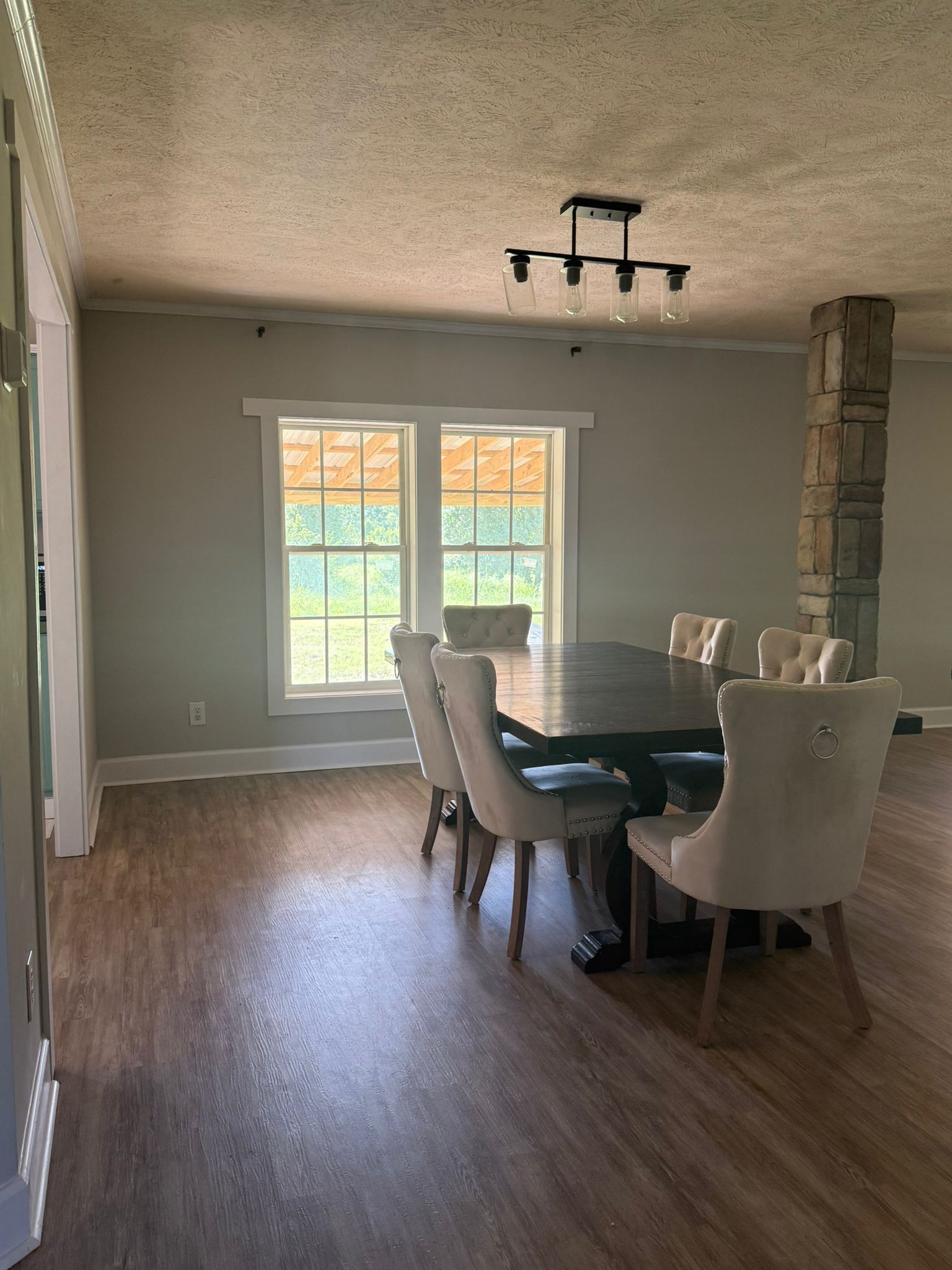4920 Youngville Road Springfield, TN 37172 - Photo 20 of 54 a view of a dining room with furniture window and wooden floor