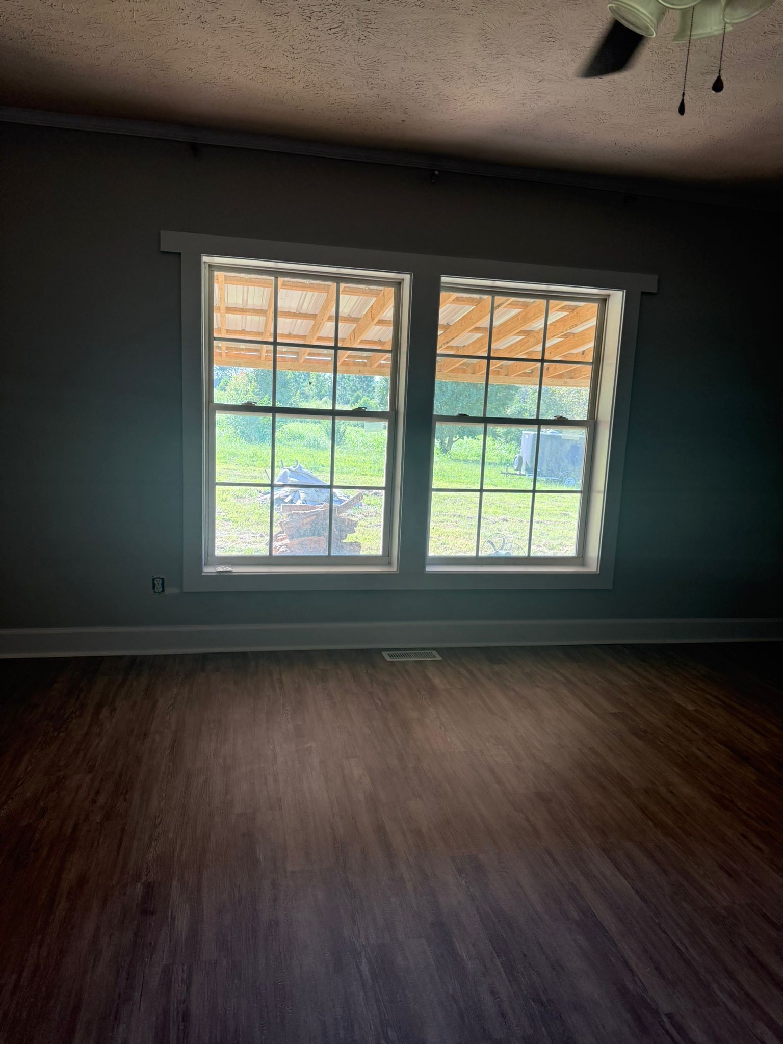 4920 Youngville Road Springfield, TN 37172 - Photo 24 of 54 a view of a livingroom with wooden floor and a window