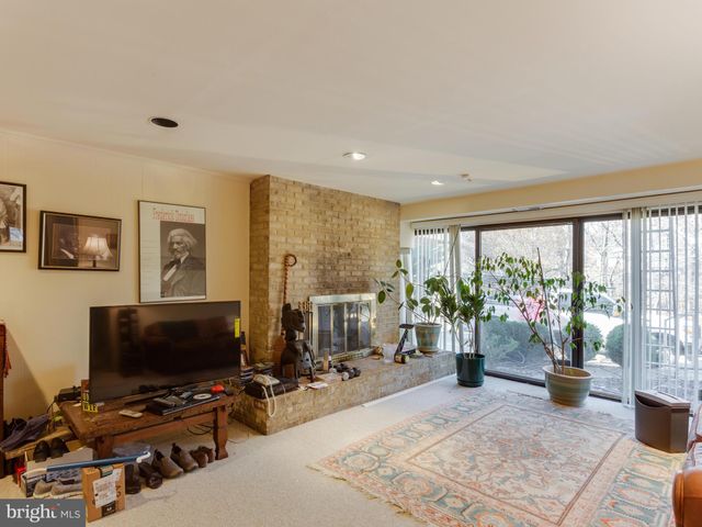 a bathroom with a sink toilet and a mirror