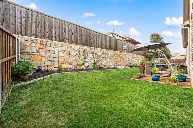 a view of a bench in front of house