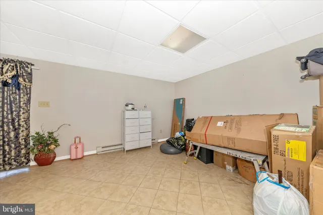 a bedroom with furniture and a couch