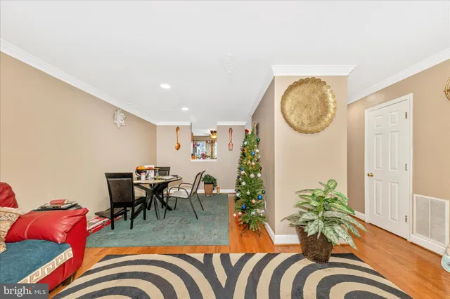 a view of a livingroom with furniture and lounge chair