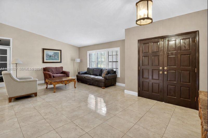 15181 Southwest 156th Terrace Miami, FL 33187 - Photo 16 of 43 a living room with furniture
