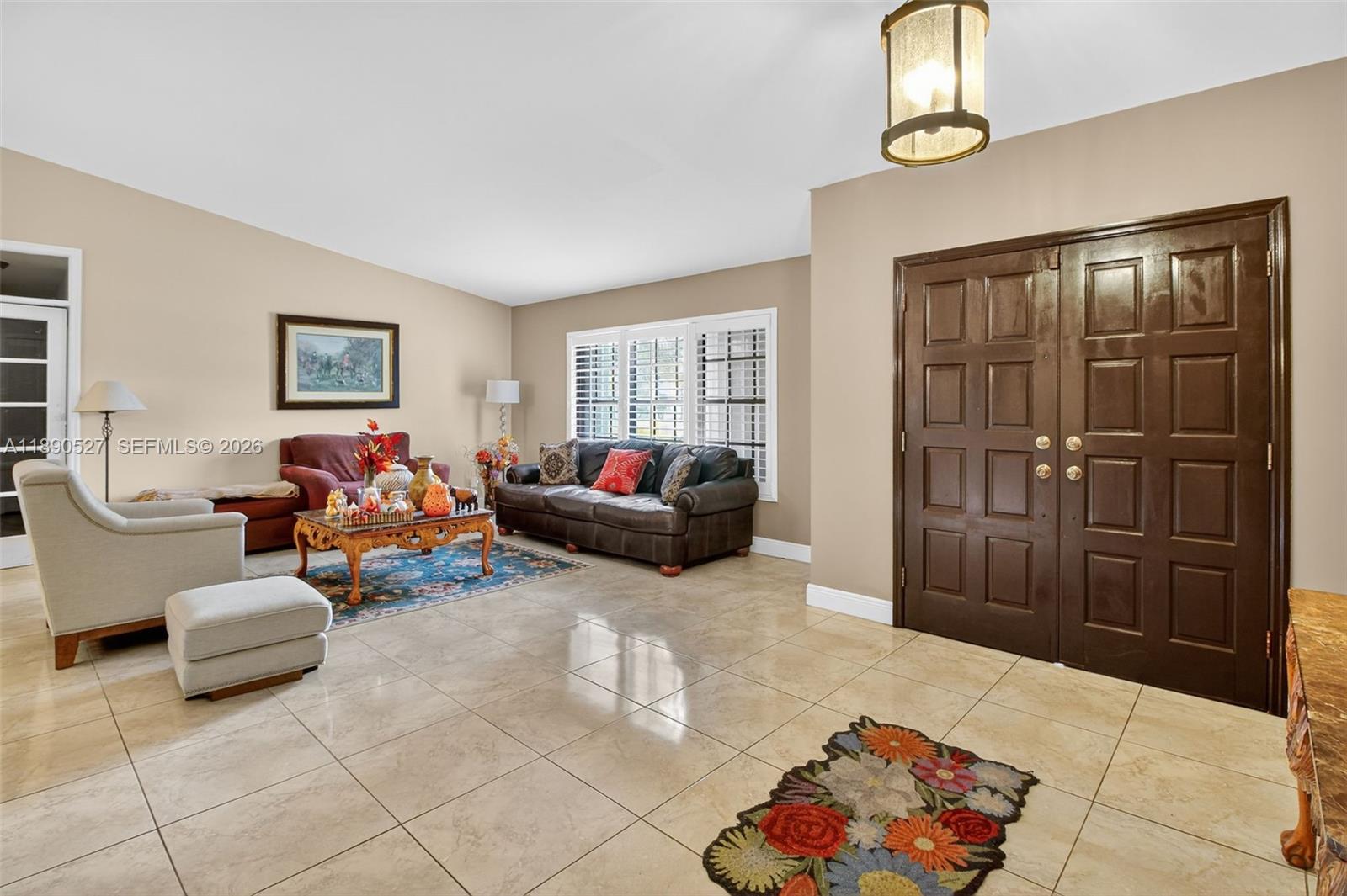 15181 Southwest 156th Terrace Miami, FL 33187 - Photo 17 of 43 a living room with furniture