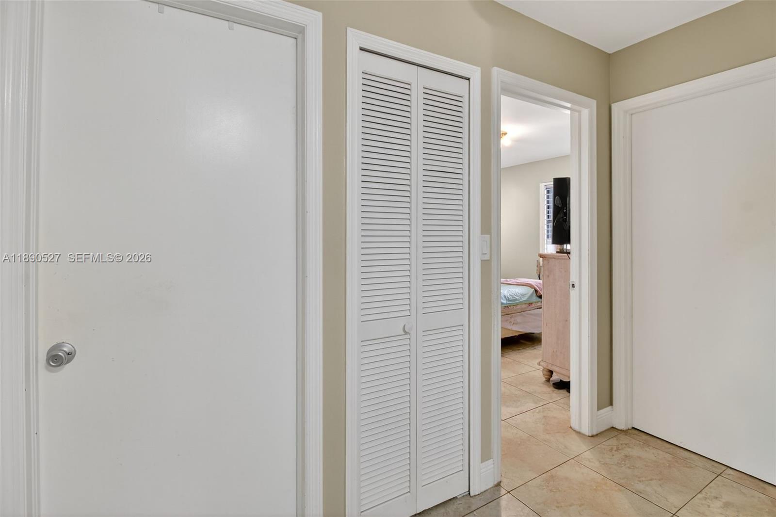 15181 Southwest 156th Terrace Miami, FL 33187 - Photo 32 of 32 a view of a bathroom from a hallway