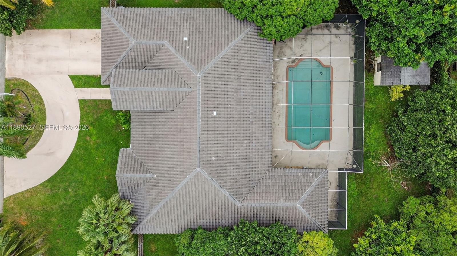 15181 Southwest 156th Terrace Miami, FL 33187 - Photo 35 of 43 front view of a house with a small garden