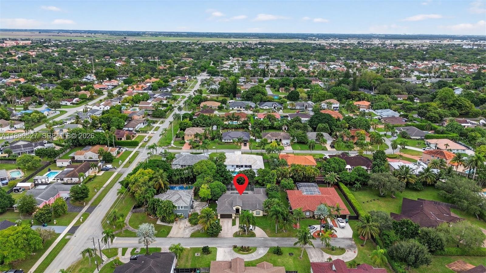 15181 Southwest 156th Terrace Miami, FL 33187 - Photo 37 of 43 an aerial view of residential houses with outdoor space and trees