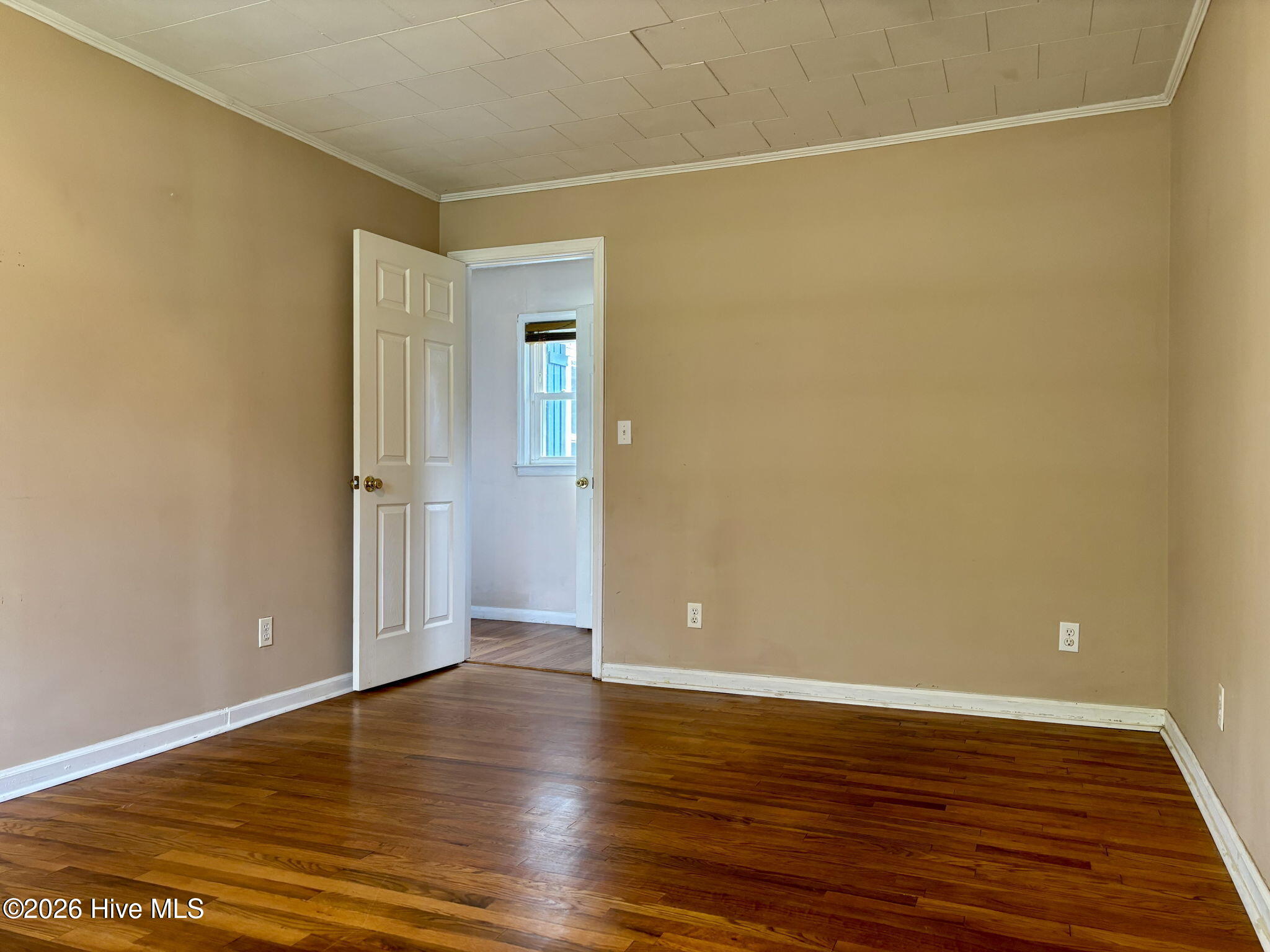 580 Gillikin Road Beaufort, NC 28516 - Photo 20 of 43 Primary Bedroom w/ Hardwood Floors