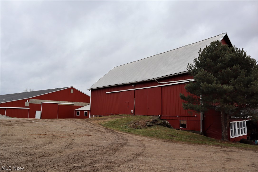 8544 River Styx Road Wadsworth, OH 44281 - Photo 13 of 35 Rear view, Bank barn and equestrian facility.