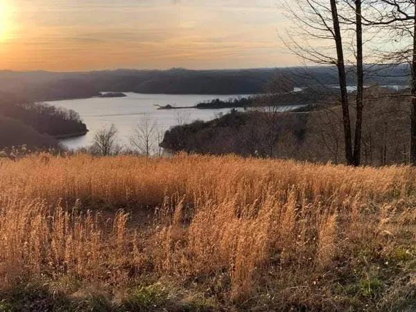 a view of lake with mountain