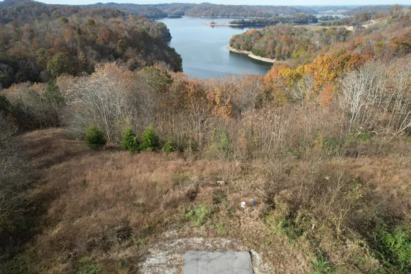 a view of lake with green space