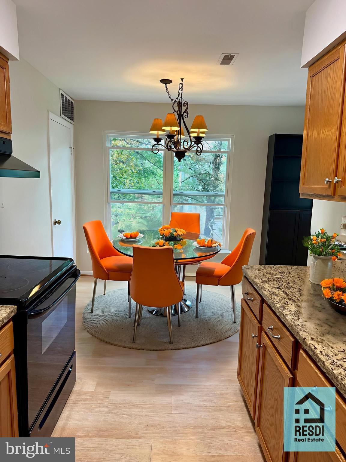 18290 Rolling Meadow Way, Unit 4 Olney, MD 20832 - Photo 13 of 18 a view of a dining room with furniture window and outside view