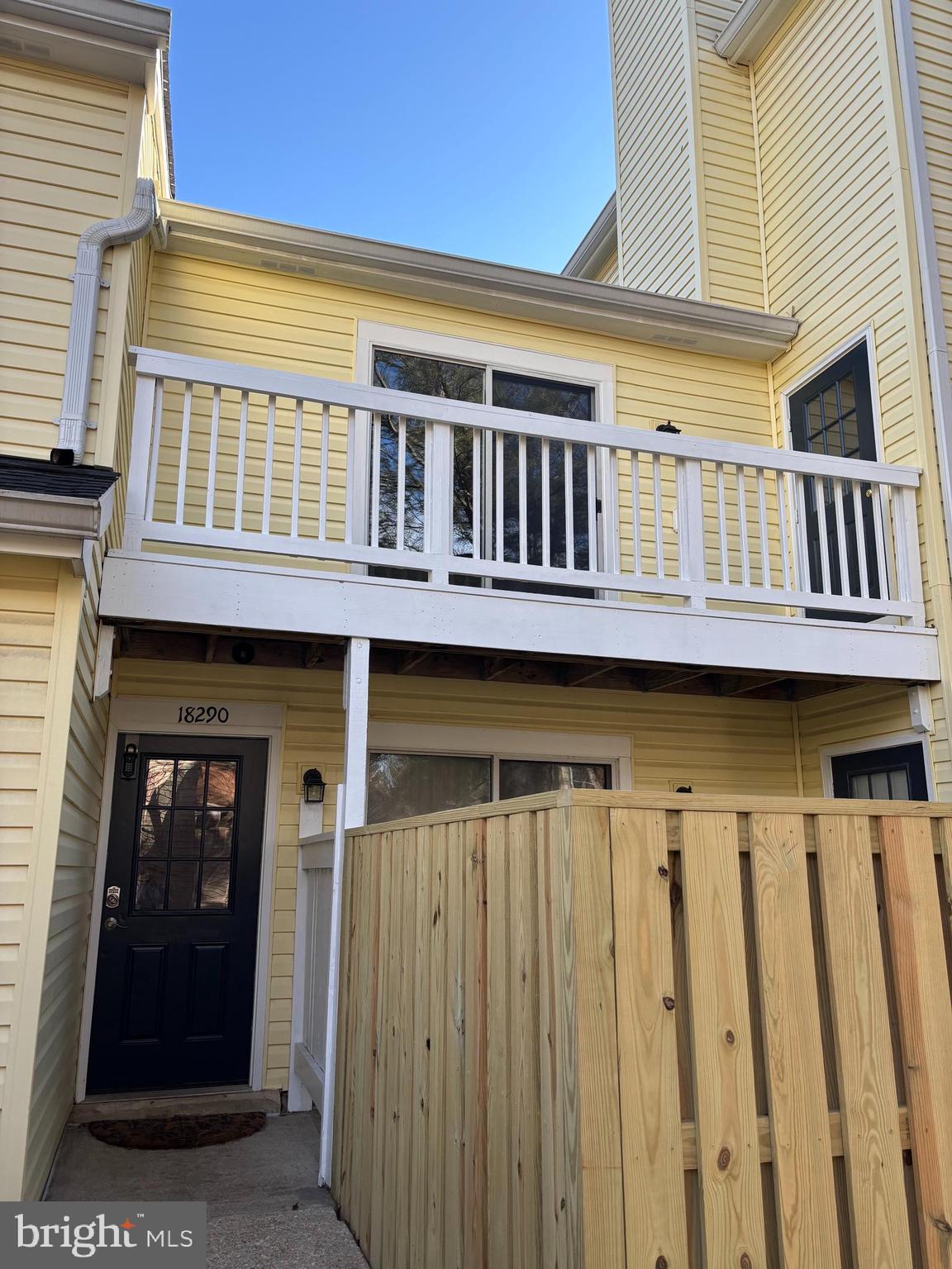 18290 Rolling Meadow Way, Unit 4 Olney, MD 20832 - Photo 16 of 18 a front view of a building with many windows