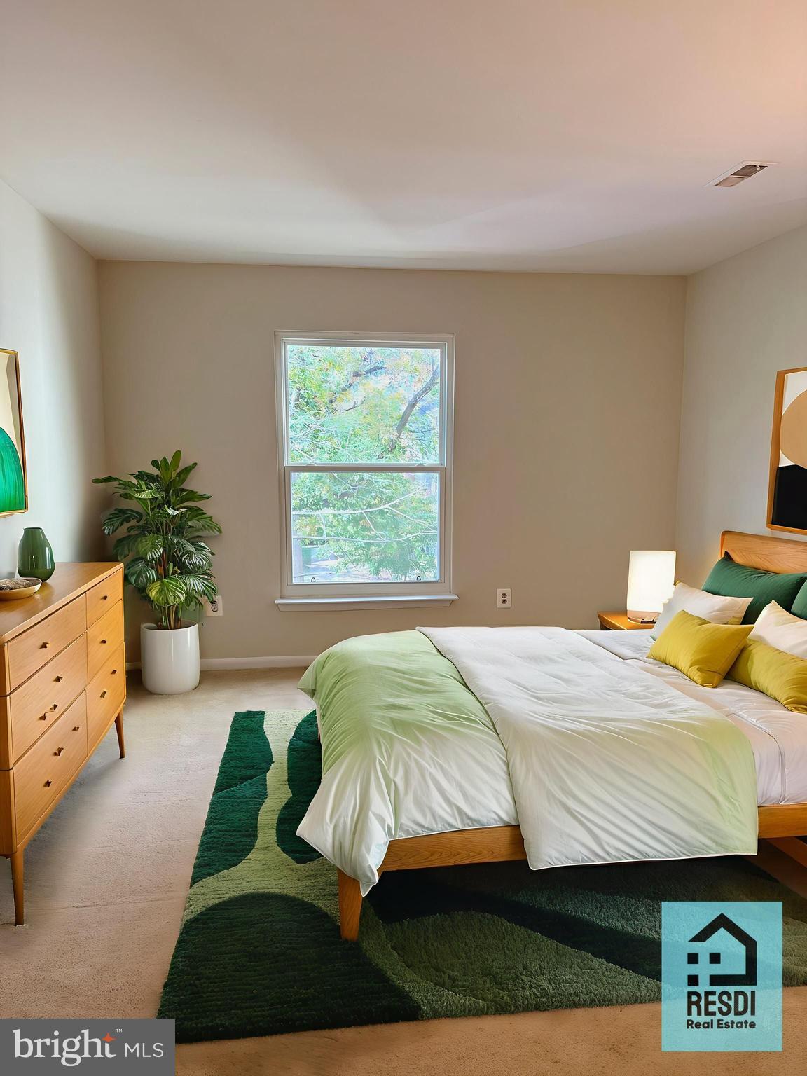 18290 Rolling Meadow Way, Unit 4 Olney, MD 20832 - Photo 5 of 18 a bedroom with a bed dresser flowerpot and window