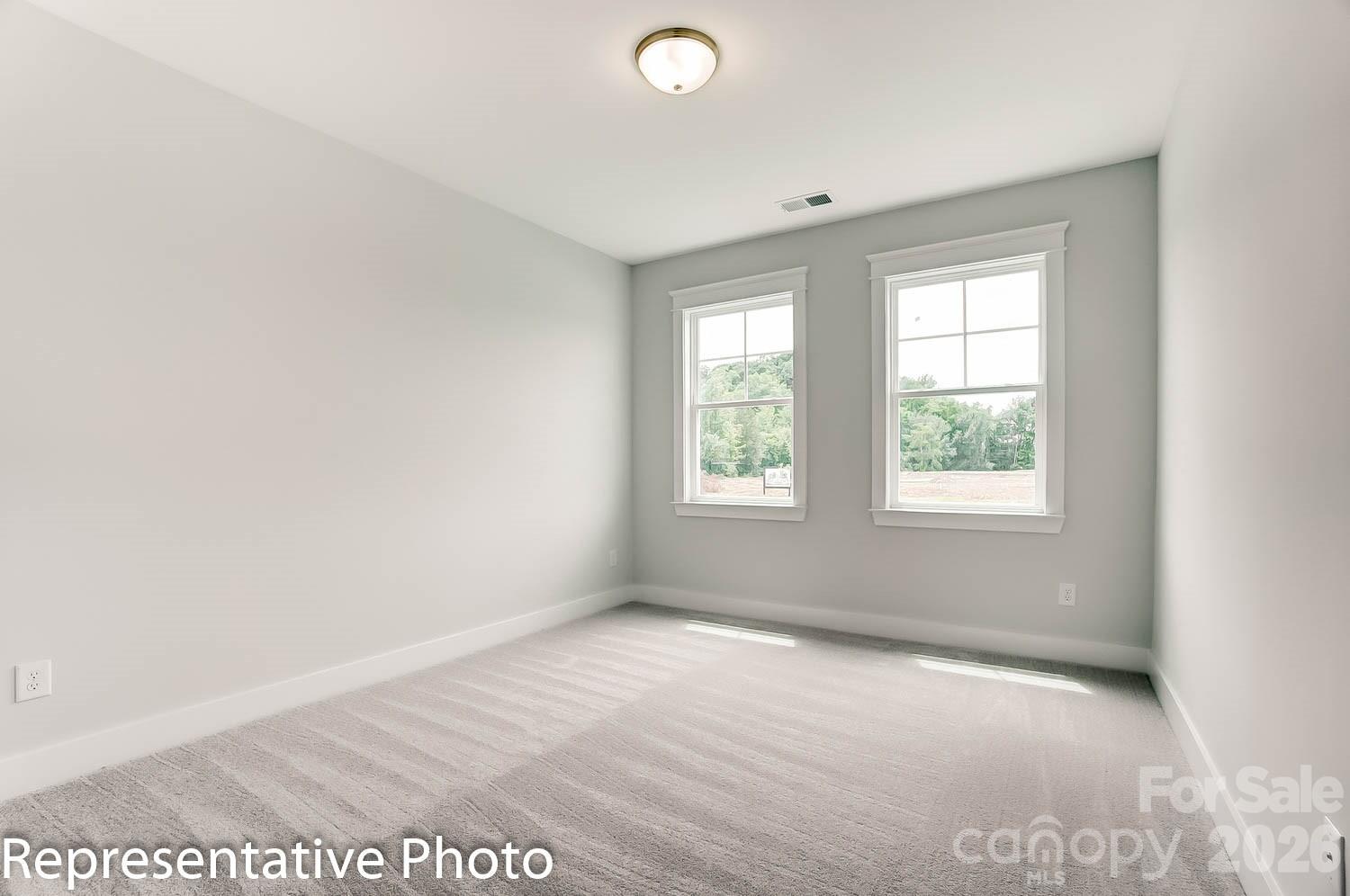 2245 Tabor Road Sherrills Ford, NC 28673 - Photo 16 of 34 an empty room with windows
