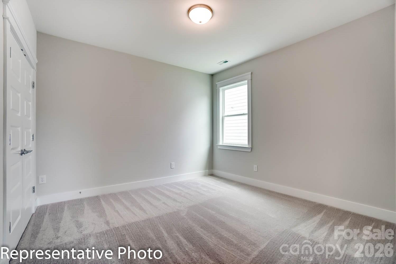2245 Tabor Road Sherrills Ford, NC 28673 - Photo 17 of 34 an empty room with a window
