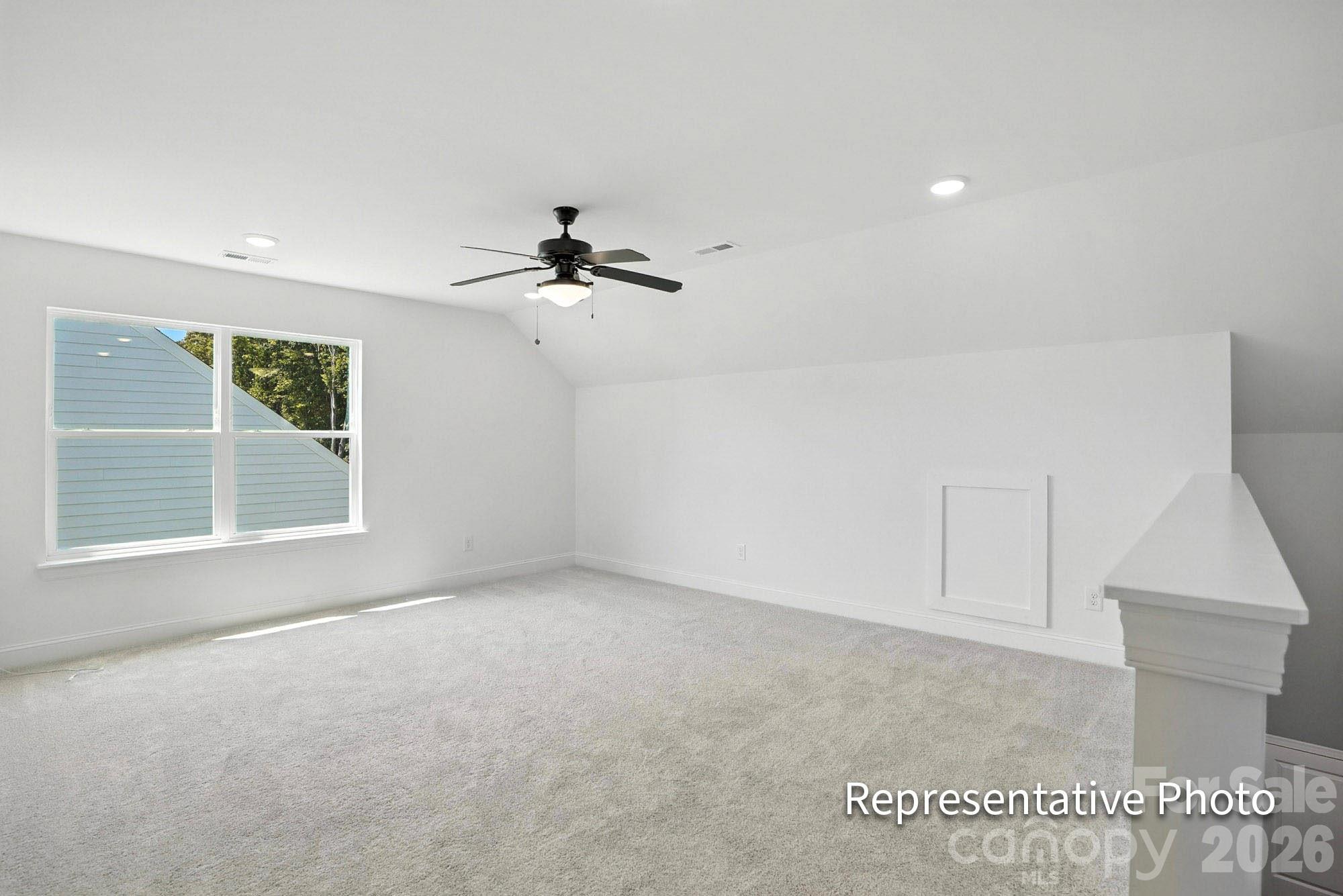 2245 Tabor Road Sherrills Ford, NC 28673 - Photo 24 of 34 a view of an empty room with a window