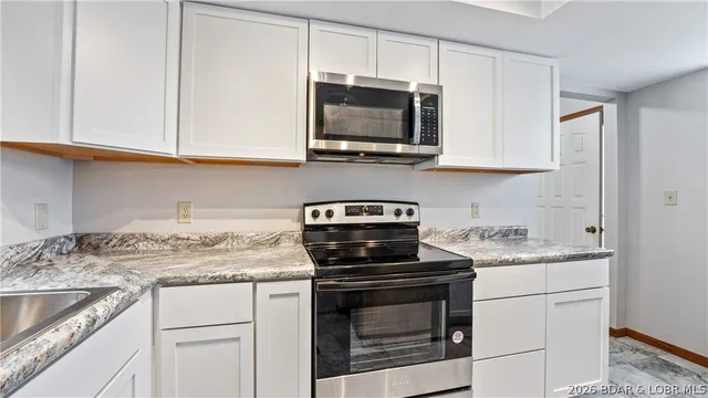 $300,000 | 56 Copper Ridge Dr Lake, Unit 1F, Lake Ozark, MO 65049