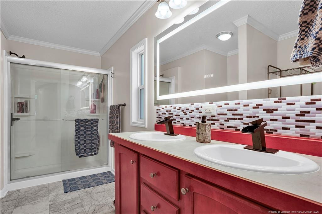 8155 Arabia Road Lumber Bridge, NC 28357 - Photo 22 of 30 a view of bathroom with shower sink and view bedroom