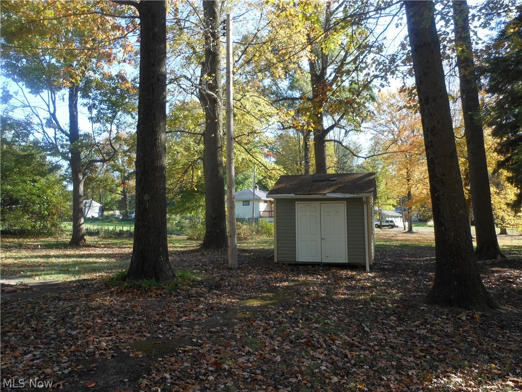 7176 Chestnut-Ridge Road Hubbard, OH 44425 - Photo 22 of 25 Shed in Backyard & view of the 2nd lot (.48 acre) being sold with the home.