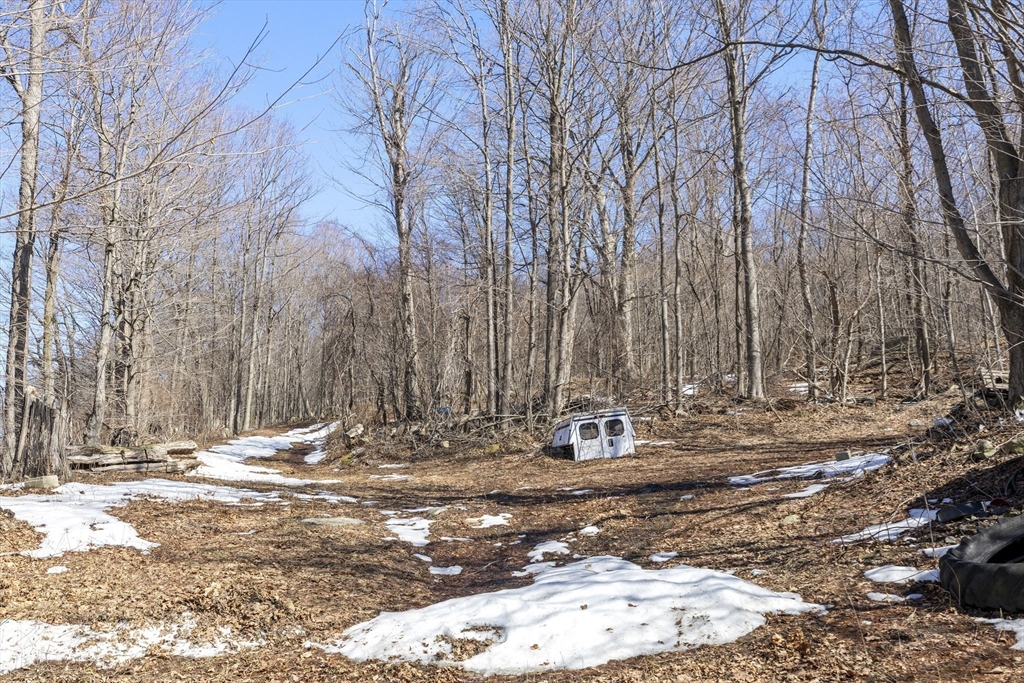 22-25 Macomber Road Monson, MA 01057 - Photo 13 of 34 a view of the house with snow