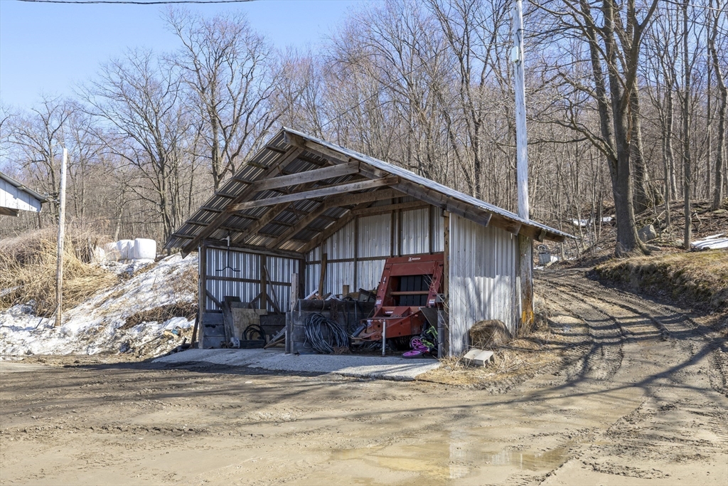 22-25 Macomber Road Monson, MA 01057 - Photo 14 of 34 a view of a house with snow on the wall