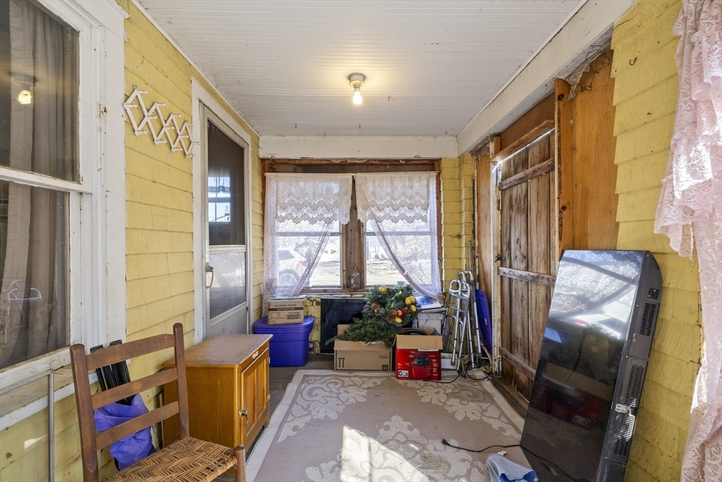 22-25 Macomber Road Monson, MA 01057 - Photo 24 of 34 a living room with furniture and a window