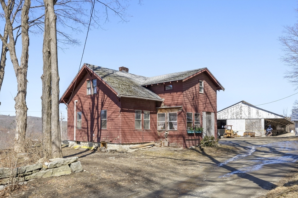 22-25 Macomber Road Monson, MA 01057 - Photo 3 of 34 a view of a house with wooden fence