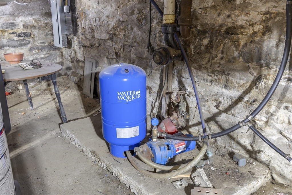 22-25 Macomber Road Monson, MA 01057 - Photo 31 of 34 a view of a backyard with table and chairs