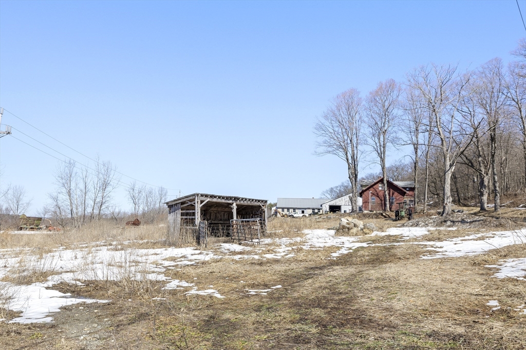 22-25 Macomber Road Monson, MA 01057 - Photo 10 of 34 a view of a yard with snow on the road