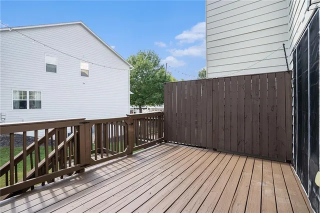 a balcony with wooden floor