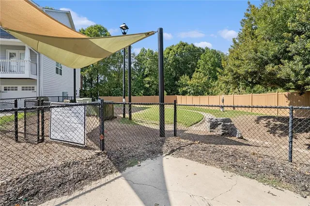 a view of a backyard with a slide