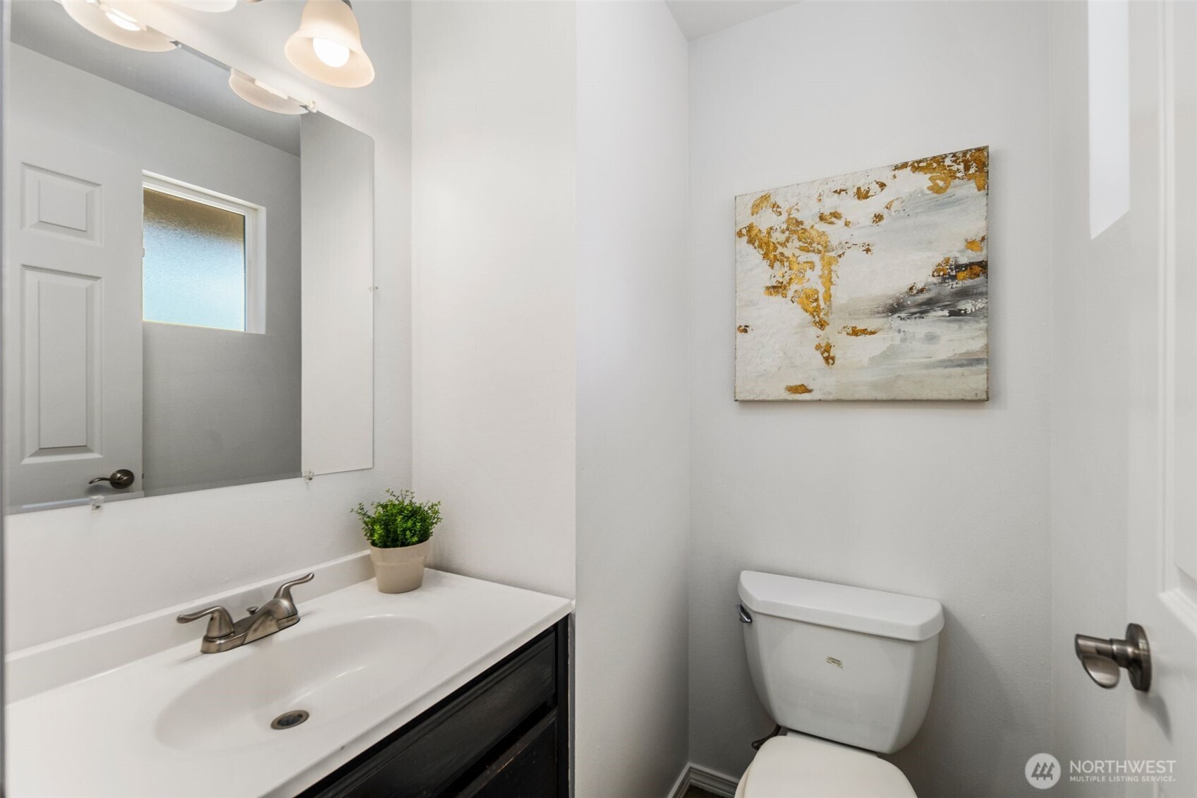 20101 95th Place Northeast Bothell, WA 98011 - Photo 15 of 37 a bathroom with a toilet sink and mirror