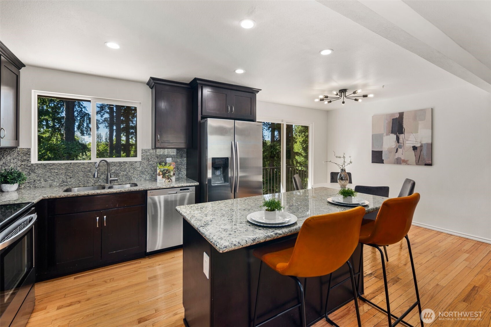 20101 95th Place Northeast Bothell, WA 98011 - Photo 16 of 37 a kitchen with a table and chairs in it