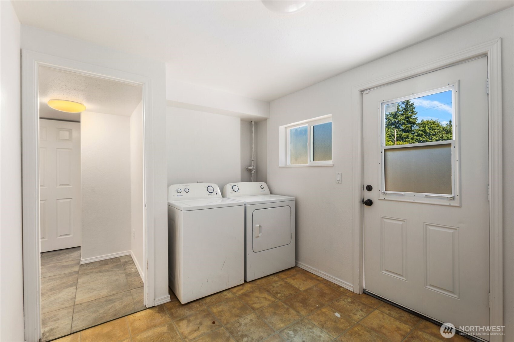20101 95th Place Northeast Bothell, WA 98011 - Photo 17 of 37 a utility room with dryer and washer