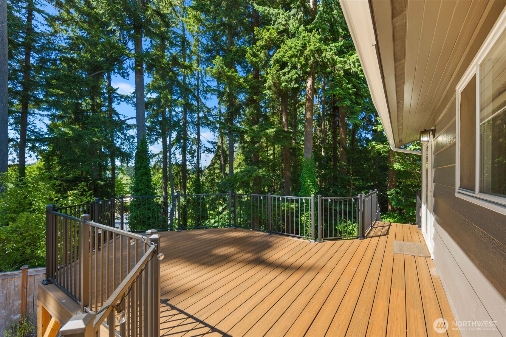 20101 95th Place Northeast Bothell, WA 98011 - Photo 20 of 37 a view of balcony with wooden floor and fence