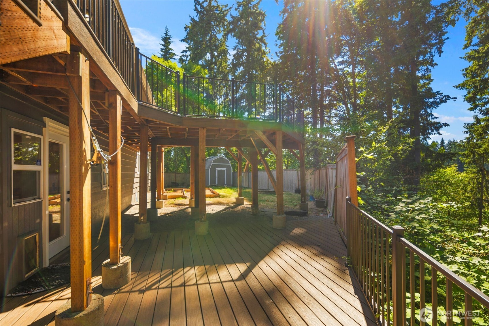 20101 95th Place Northeast Bothell, WA 98011 - Photo 22 of 37 a view of a balcony with wooden floor