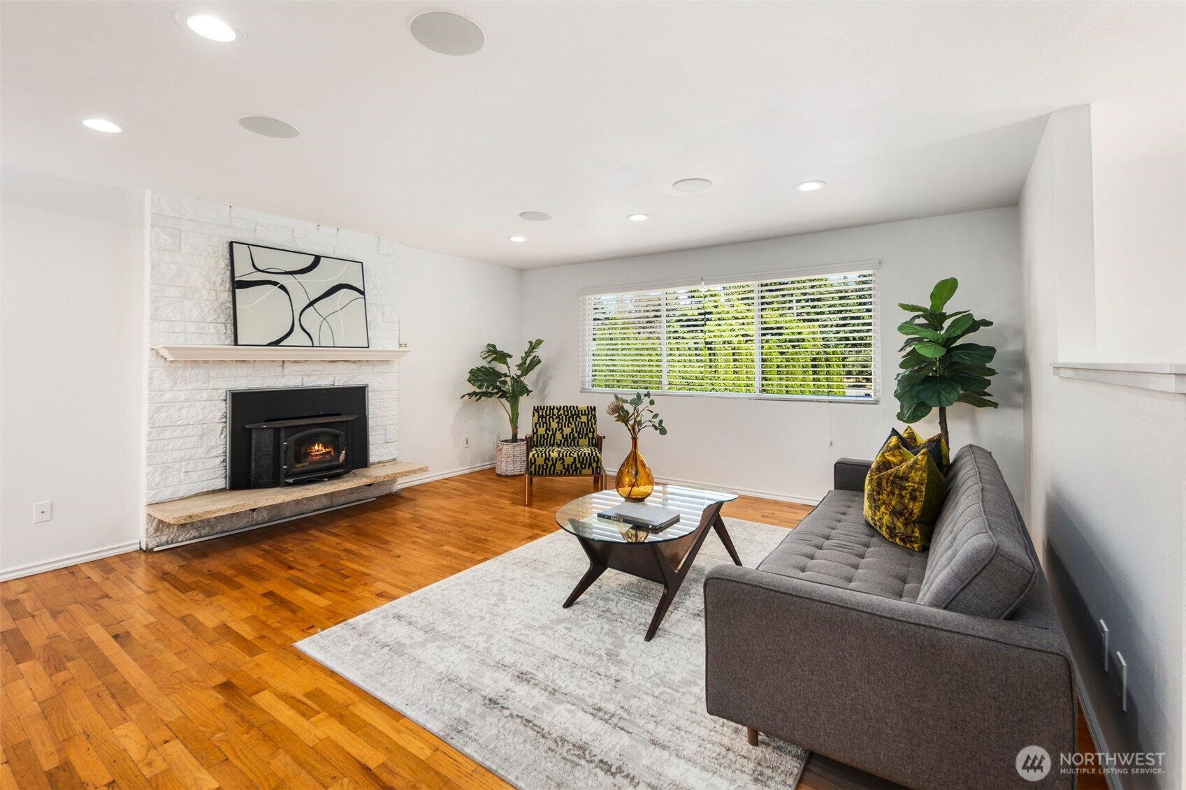 20101 95th Place Northeast Bothell, WA 98011 - Photo 4 of 37 a living room with furniture and a fireplace