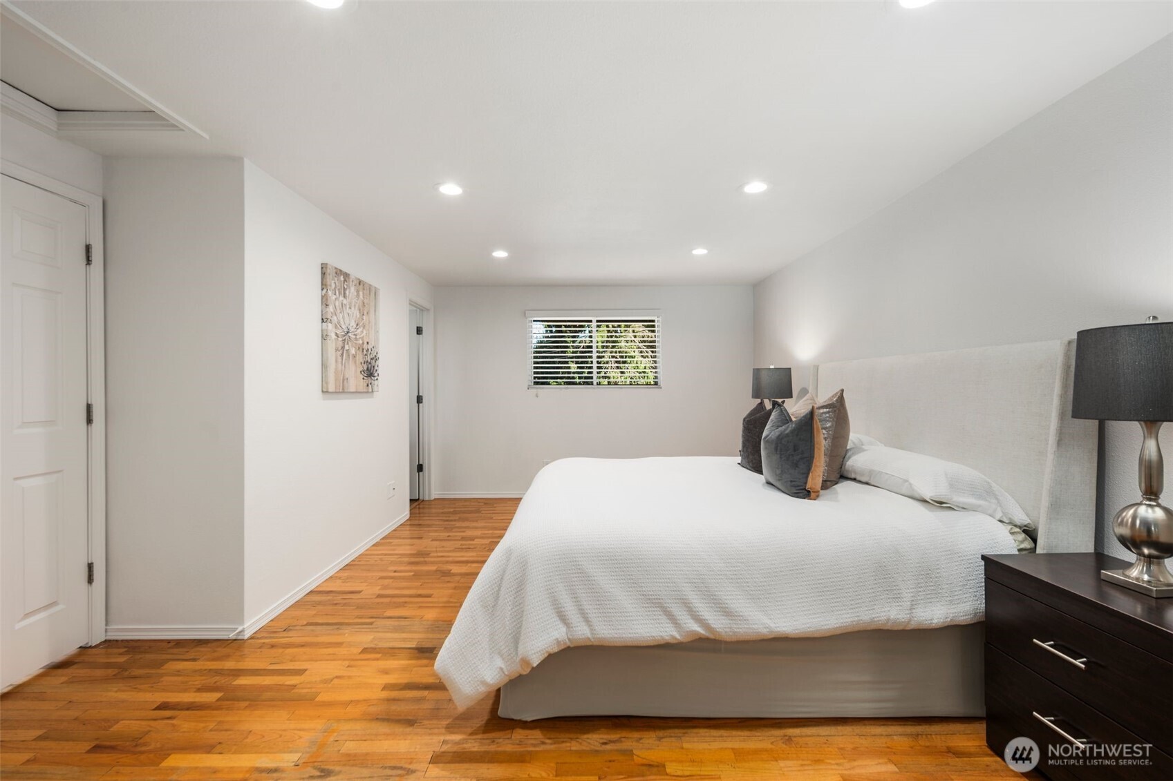 20101 95th Place Northeast Bothell, WA 98011 - Photo 7 of 37 a bedroom with a bed and a lamp