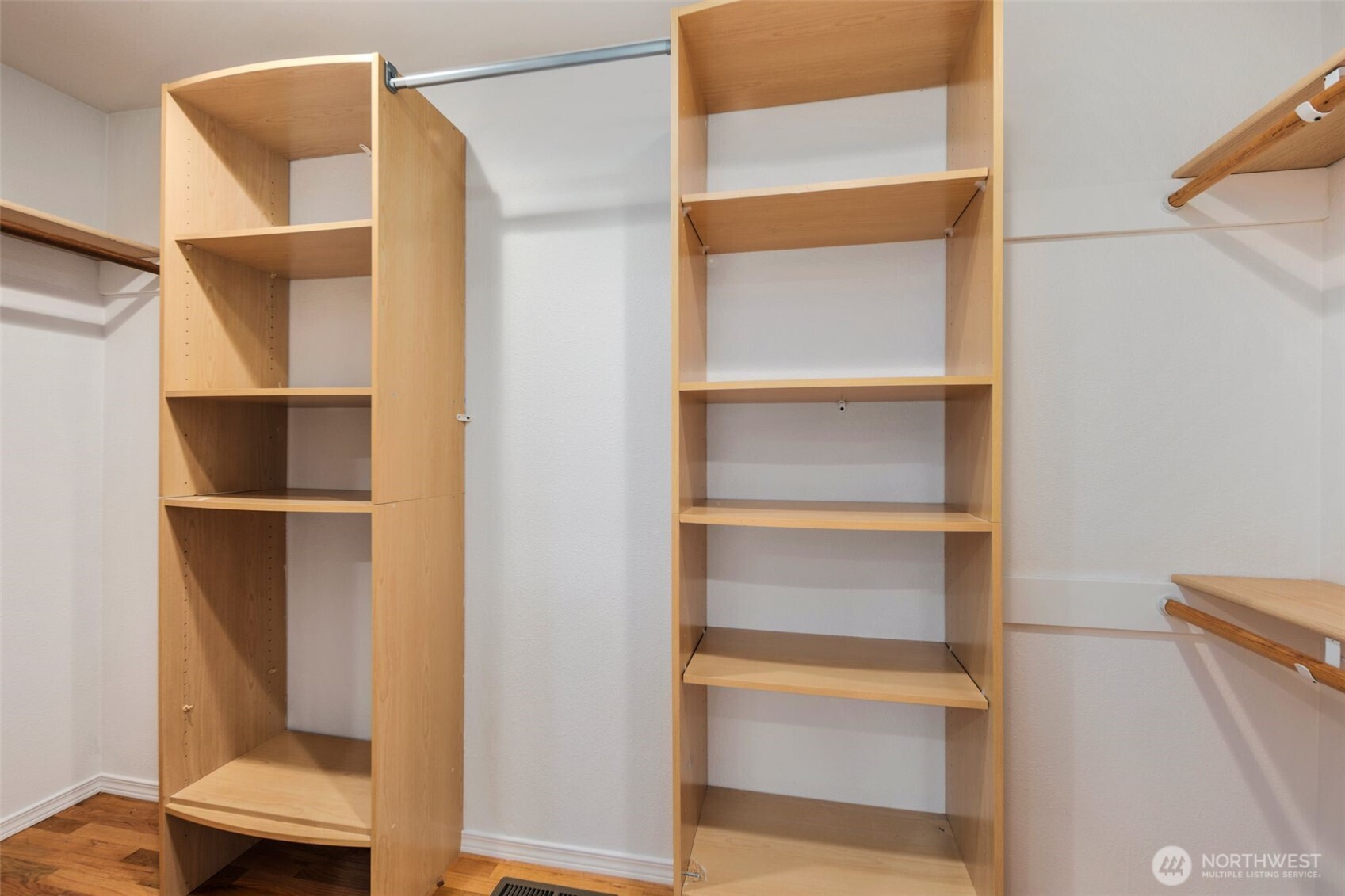 20101 95th Place Northeast Bothell, WA 98011 - Photo 8 of 37 a view of walk in closet with empty racks